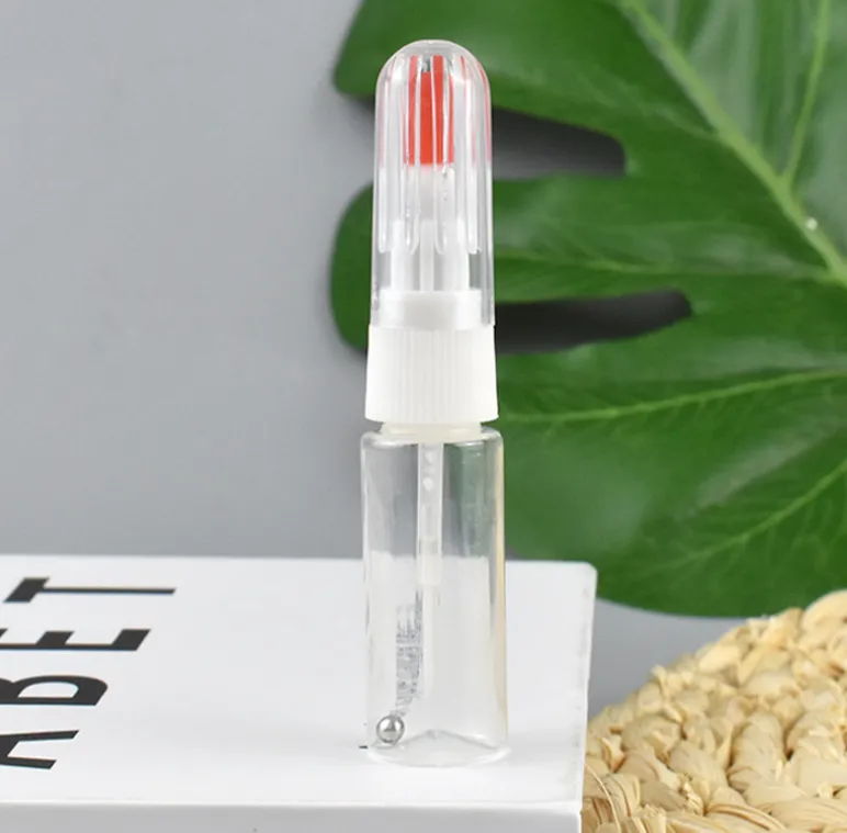 Ampolla de ploma de pintura de retoc buida amb punta de pinzell